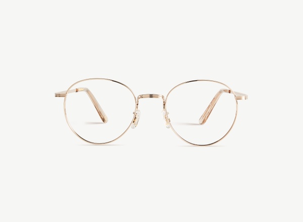 Front view of a pair of eyeglasses called the Prodigy in Gold