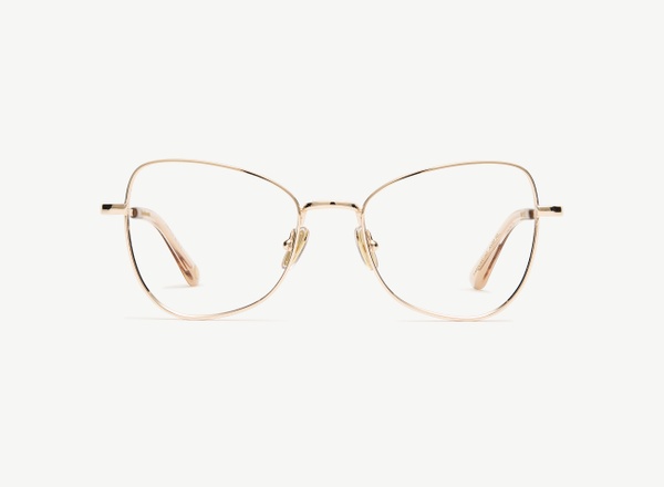 Front view of a pair of eyeglasses called the Muse in Gold