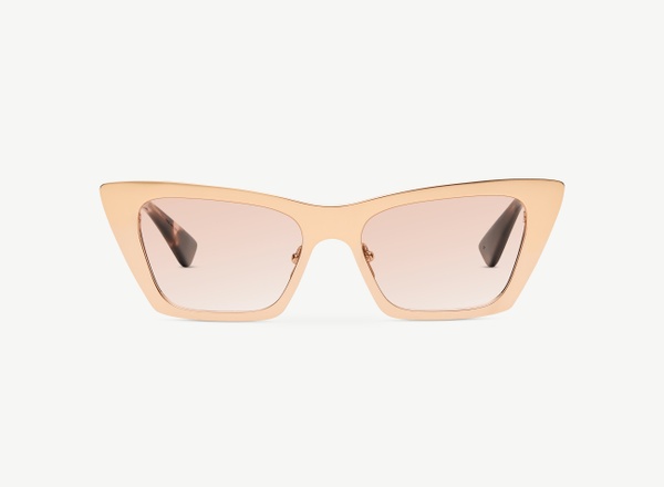 Front view of a pair of eyeglasses called the Glow in Rose Gold