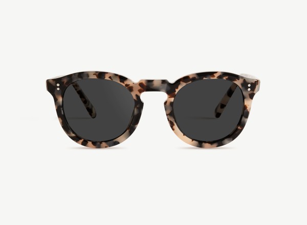 Front view of a pair of eyeglasses called the Charmer in Latte