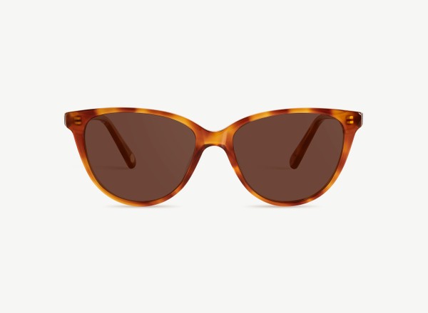 Front view of a pair of eyeglasses called the Cutie in Honey