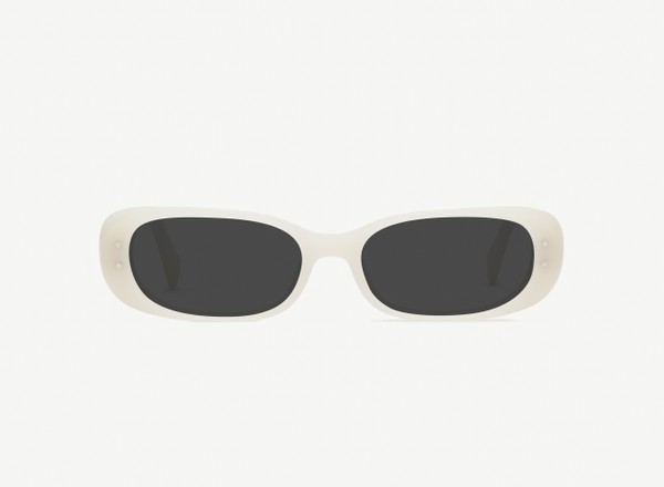Front view of a pair of eyeglasses called the Nomad in Ivory