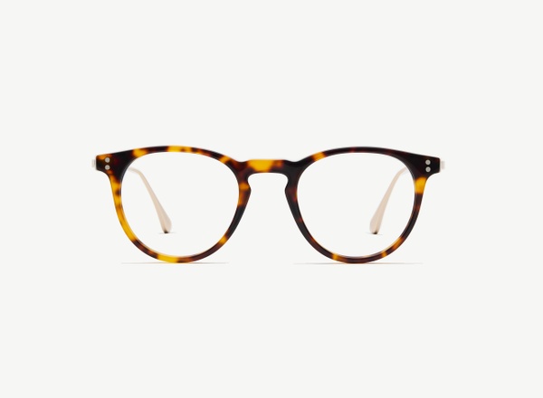 Front view of a pair of eyeglasses called the Mediator in Tortoise
